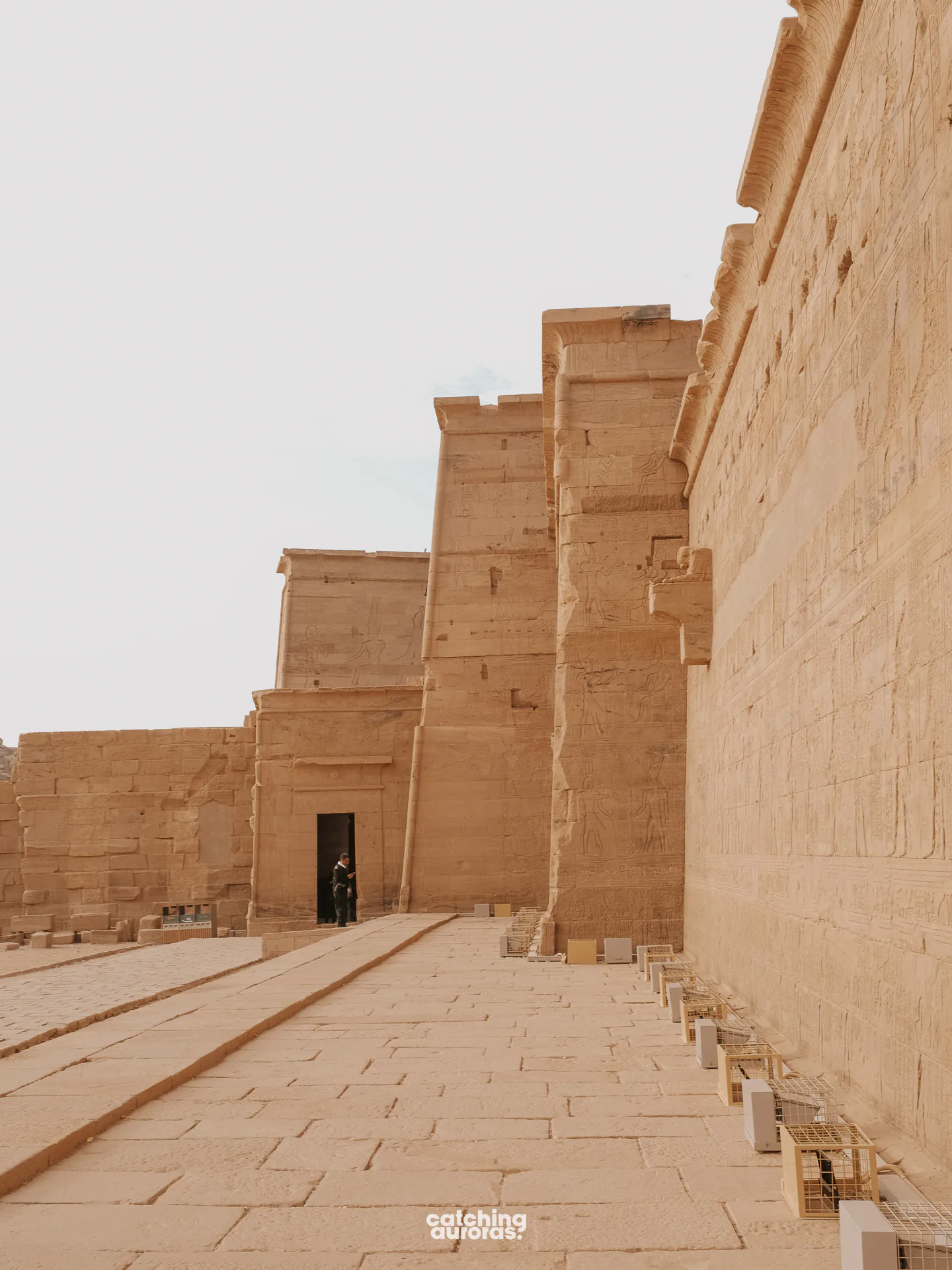 A side view of the Temple of Isis at Philae, with reliefs of Ptolemy attacking enemies, Aswan, Egypt.