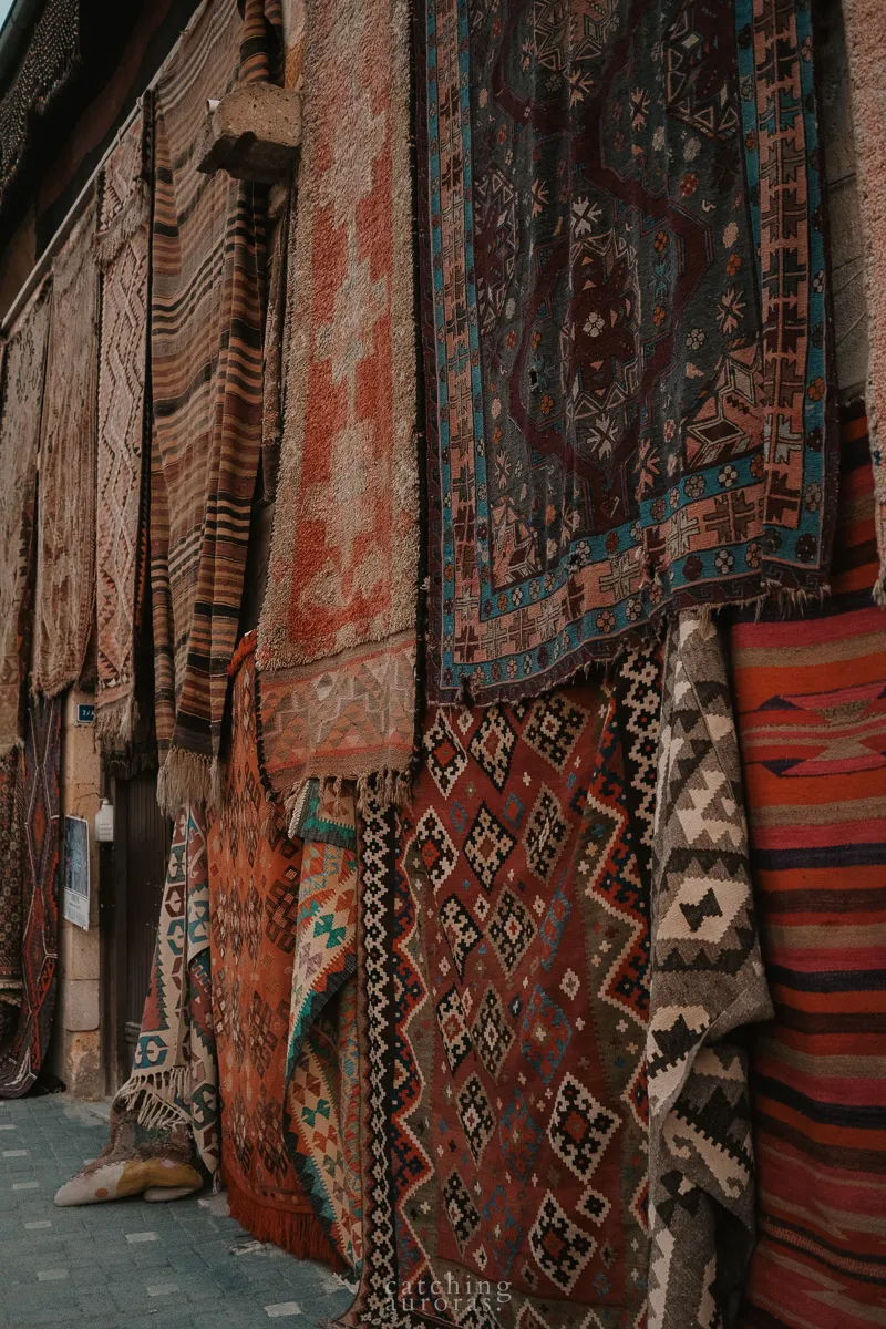 A closeup of carpets outside a shop in Cappadocia