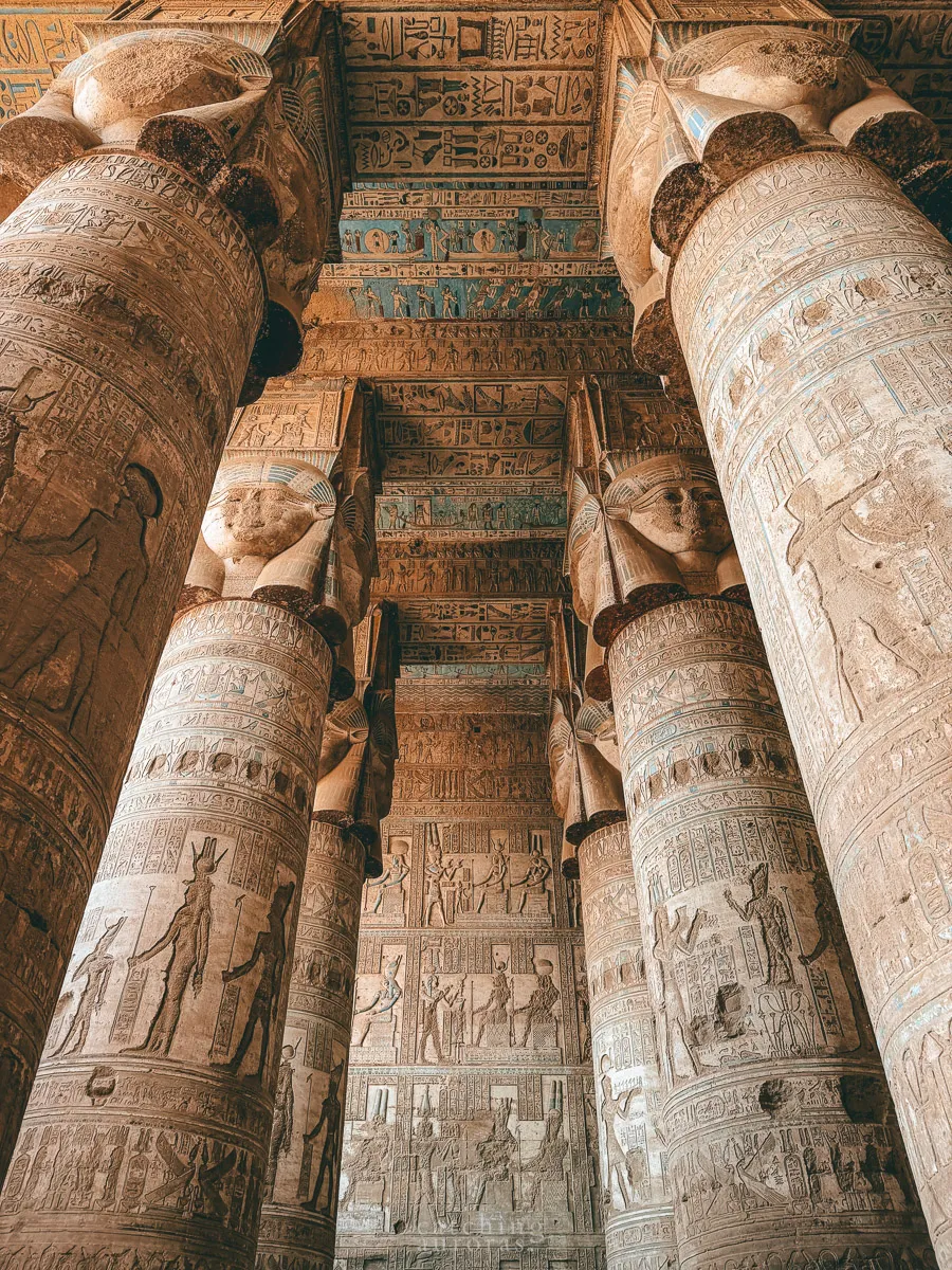 The massive hypostyle hall containing columns with Hathor in her human form