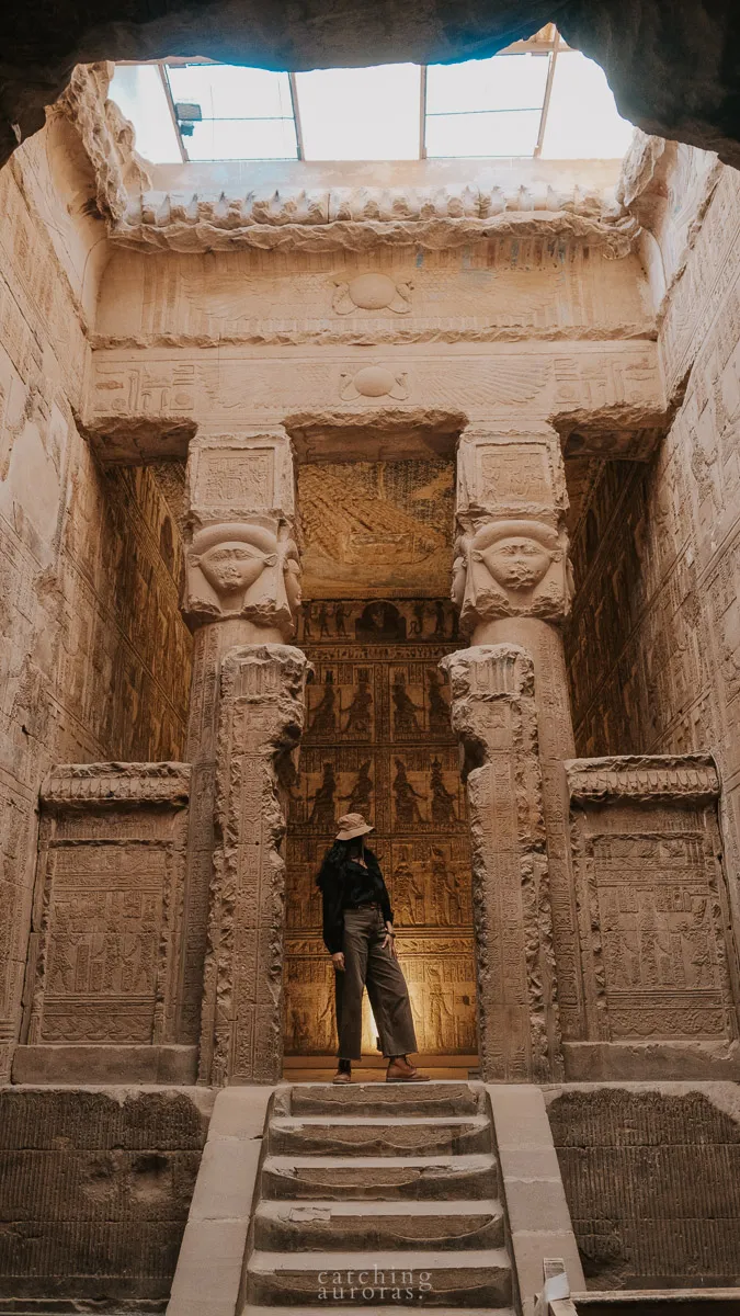 A girl posing in Dendera Temple Egypt altar