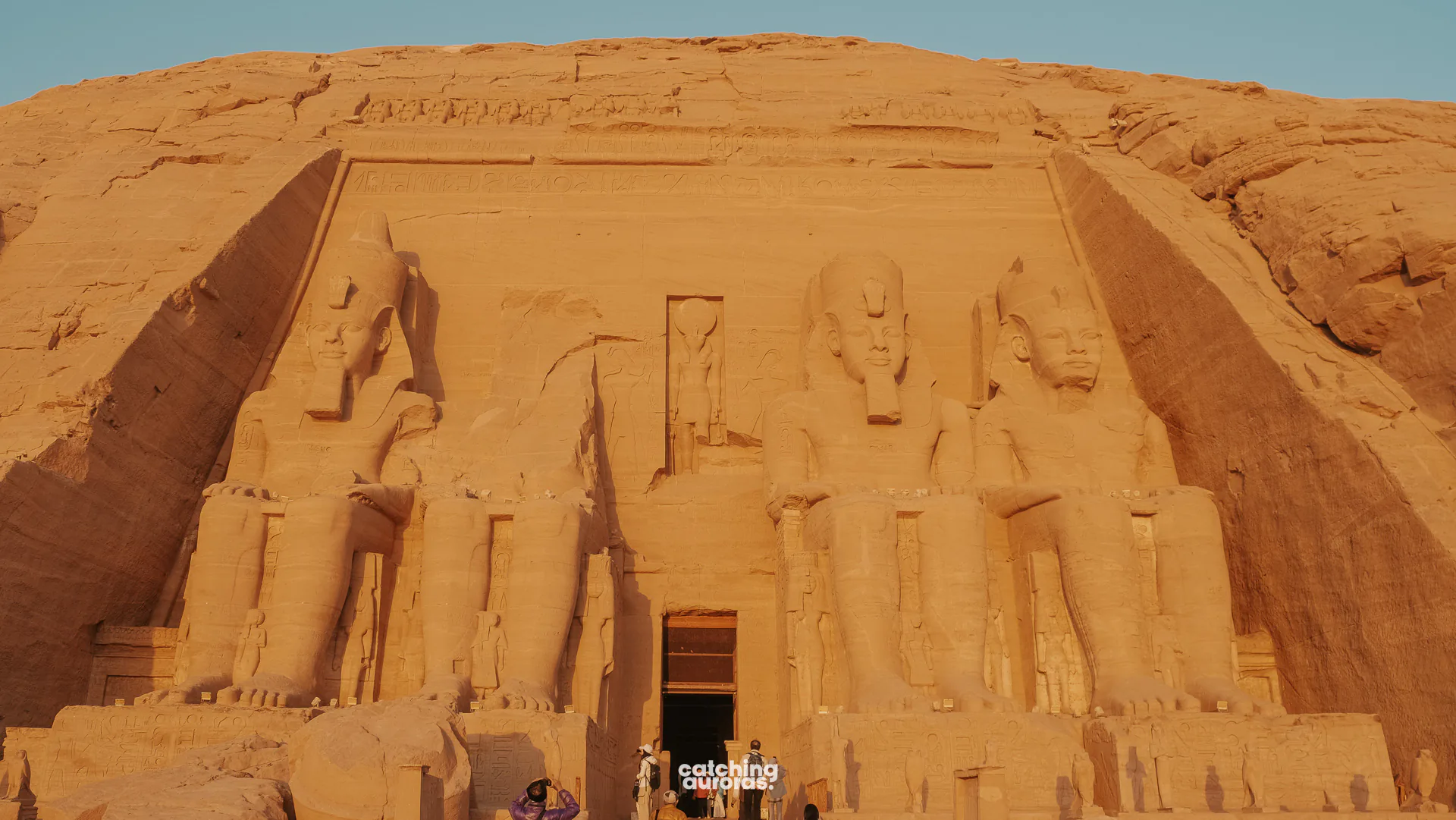 Facade of the Great Temple of Abu Simbel, with the fallen statue's fragments at its base