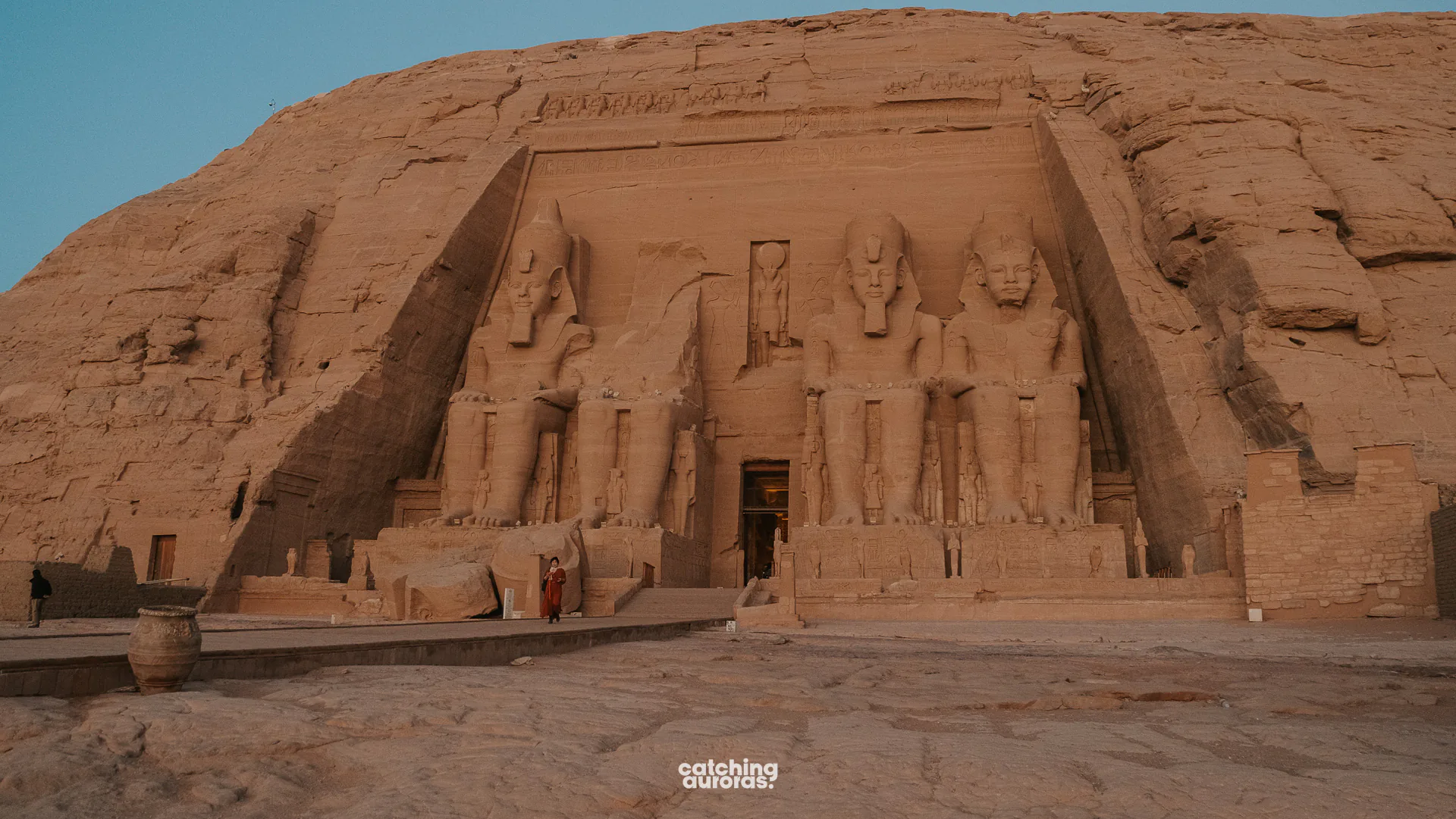 Great Temple of Abu Simbel at sunrise, with four colossal statues of Ramesses II