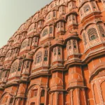 The orange facade of hawa mahal in Jaipur