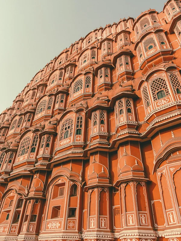 The orange facade of hawa mahal in Jaipur