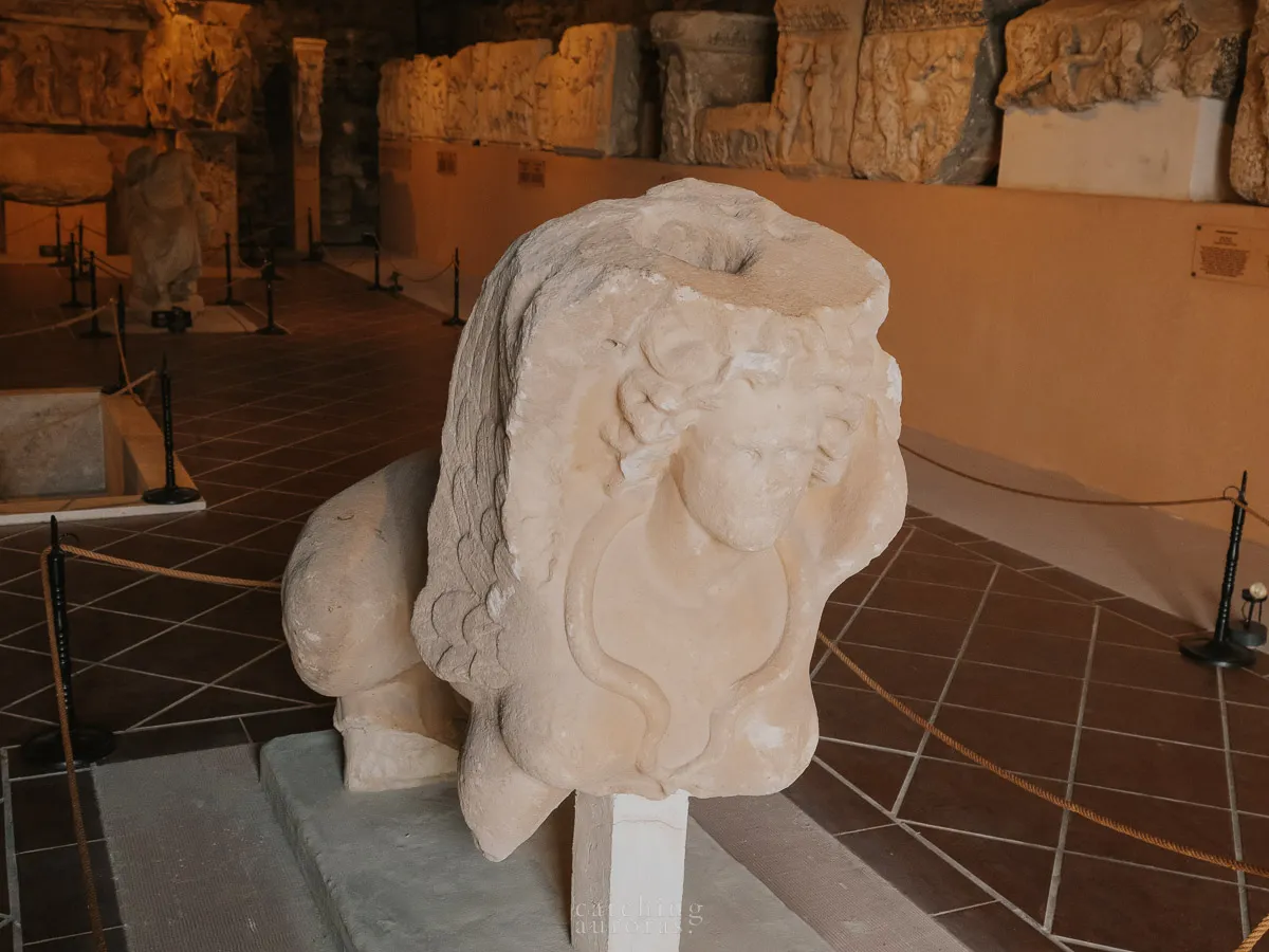 A destroyed statue of a sphinx or nymph in Pamukkale Musuem