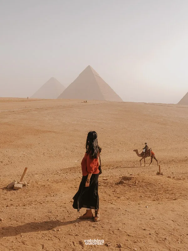 Catching Auroras author photo in front of The Great Pyramids of Giza