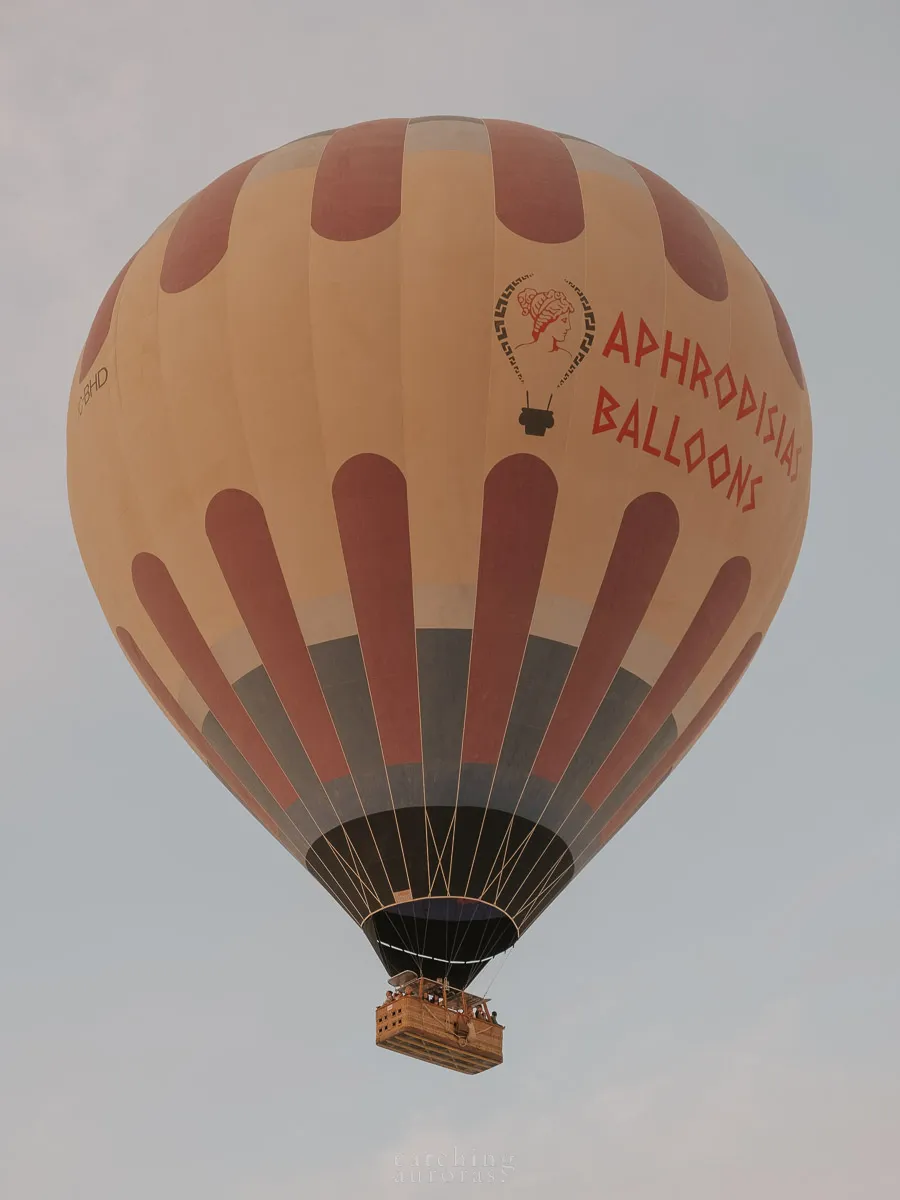 Closeup of a hot air balloon with red and yellow stripes