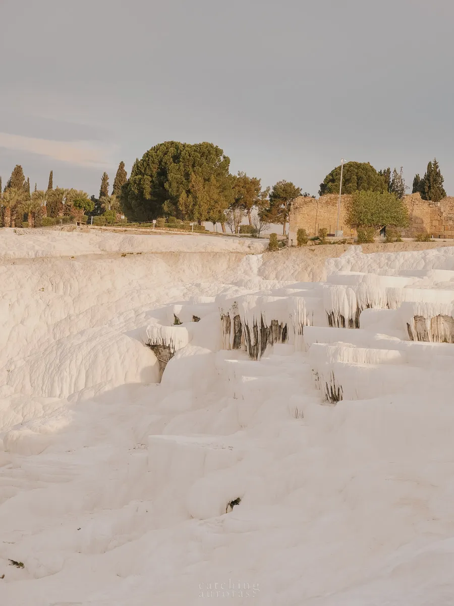Light reflects off snowy white terraces dripping with limestone