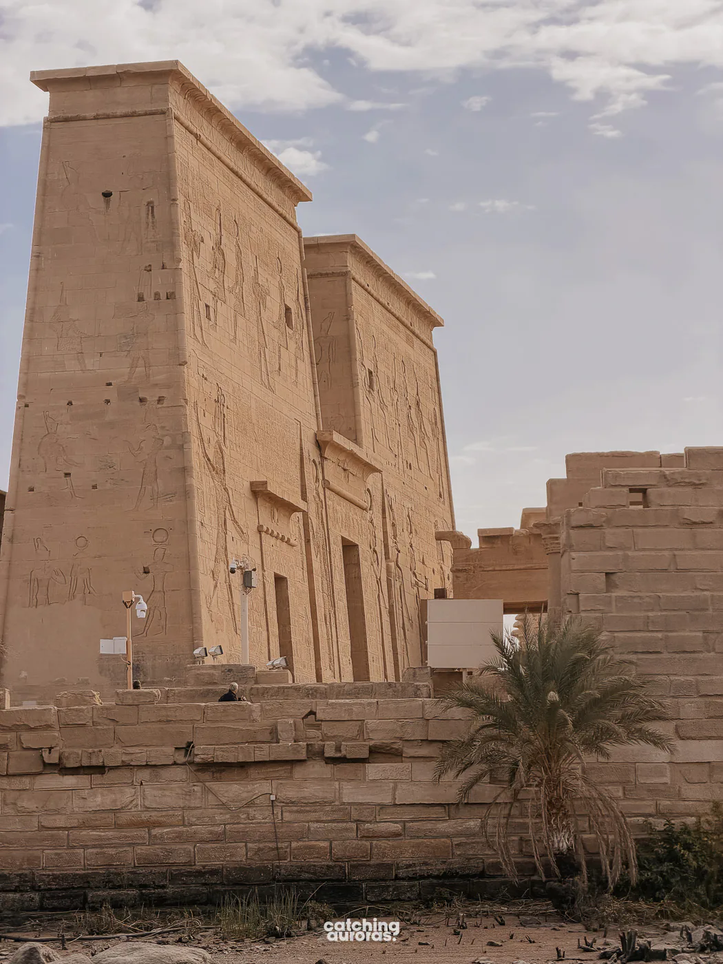 Philae Temple appearing across the water during the short boat ride from Shellal marina, Aswan, Egypt.