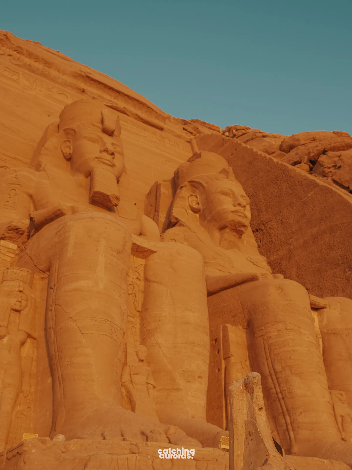 Right-hand pair of seated colossi of Ramesses II at the Great Temple, both intact