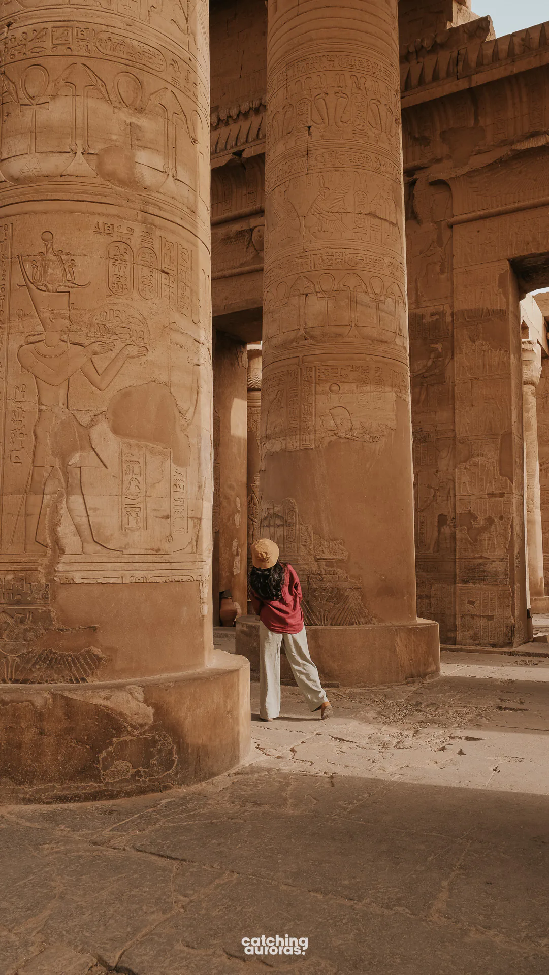 Traveller standing among the columns at Kom Ombo Temple